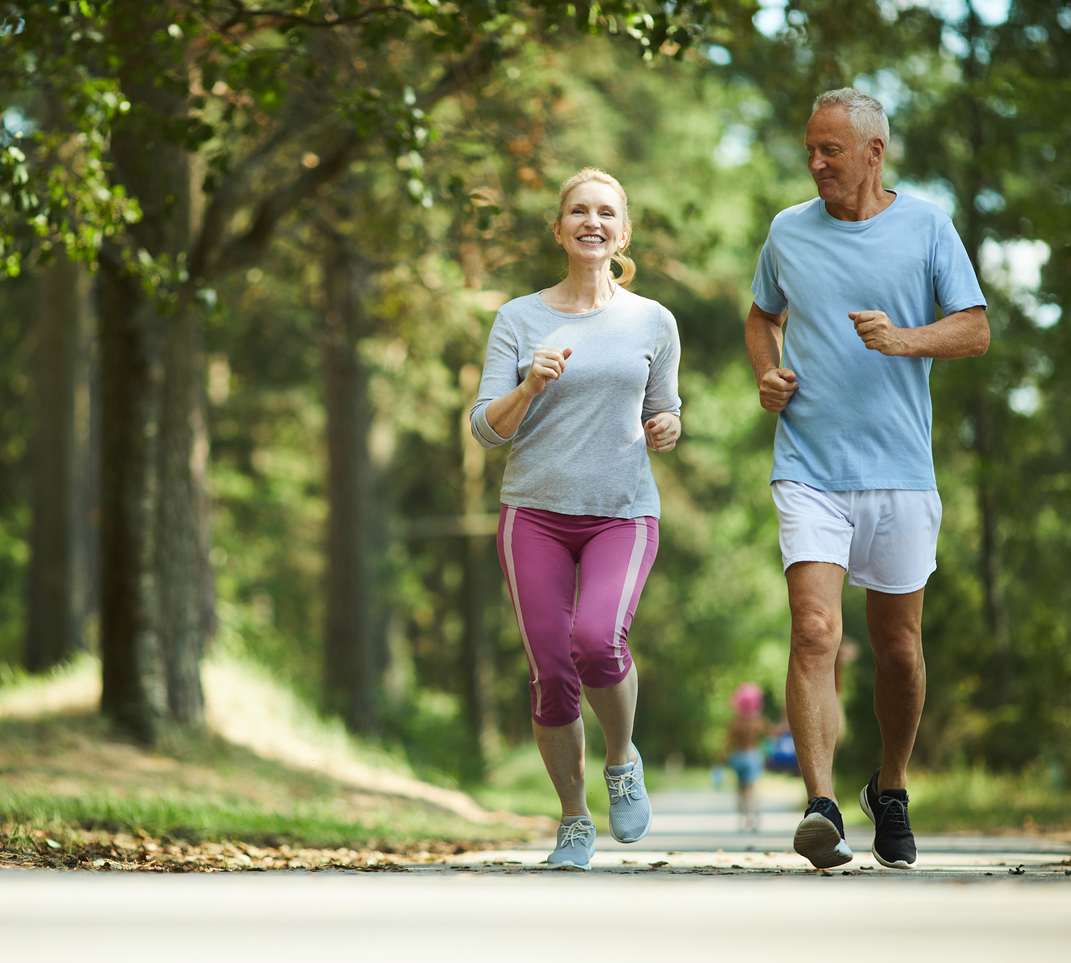 An Active elderly couple running
